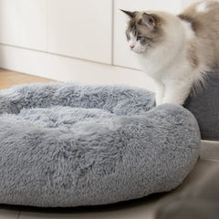 Raimaiso cama para mascotas con borde elevado, aporta soporte para cuello y cabeza.