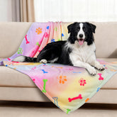 Manta Rezutan para perros con diseño de huesos, descanso cómodo.