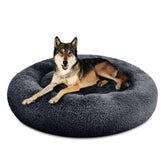 SAVFOX cama donut plush calmante para perros, vista frontal; ofrece confort y seguridad.