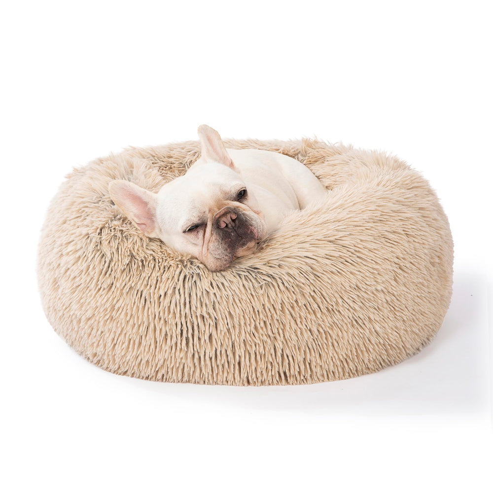 Cama SAVFOX en forma de rosquilla con pelaje sintético suave para descanso cómodo.