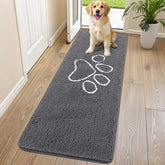 Alfombra Smiry con chenilla absorbente para patas limpias.