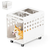 Solowinner jaula acrílica para perros, vista frontal con ruedas para moverla con facilidad.