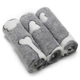 Manta SORKUT con textura doble cara velvet gris, ideal para mantener cálida a tu mascota