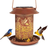 Tepaken alimentador de aves exterior con iluminación solar, ideal para jardines.
