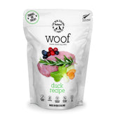 The New Zealand Natural Pet Food Co. Woof Receta de Pato Liofilizado – envase y porciones para servir.