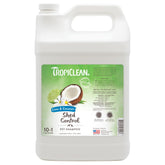 TropiClean Deshedding Shampoo: botella lima y coco para limpieza suave y desenredado