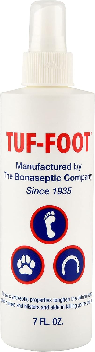 Protección de patas para perros con TUF-FOOT, ideal para caminar sobre superficies duras.