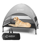 Cama para perros Veehoo exterior con dosel para dormir cómodo al aire libre.