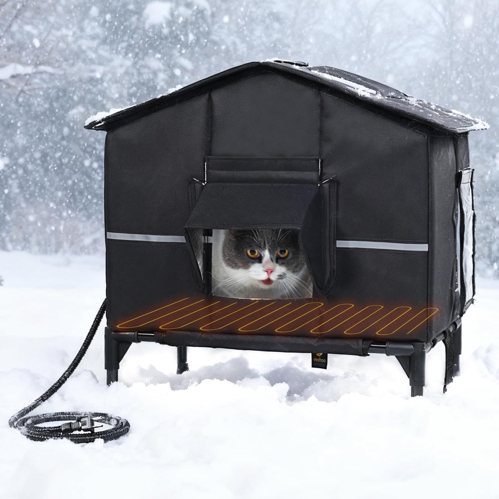 Veehoo casa-gatos-calentada-exterior con base elevada mantiene al felino seco y cálido.