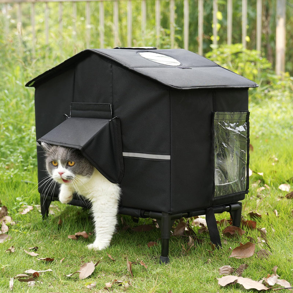 Casa para gatos Veehoo exterior con base elevada mantiene seco y cálido.