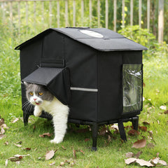 Casa para gatos Veehoo exterior con base elevada mantiene seco y cálido.