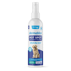 Dermabliss spray en aplicacion sobre la piel del perro para alivio suave.