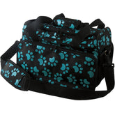 Bolso de viaje Wahl para mascotas con huellas turquesa, ideal para herramientas de cuidado.