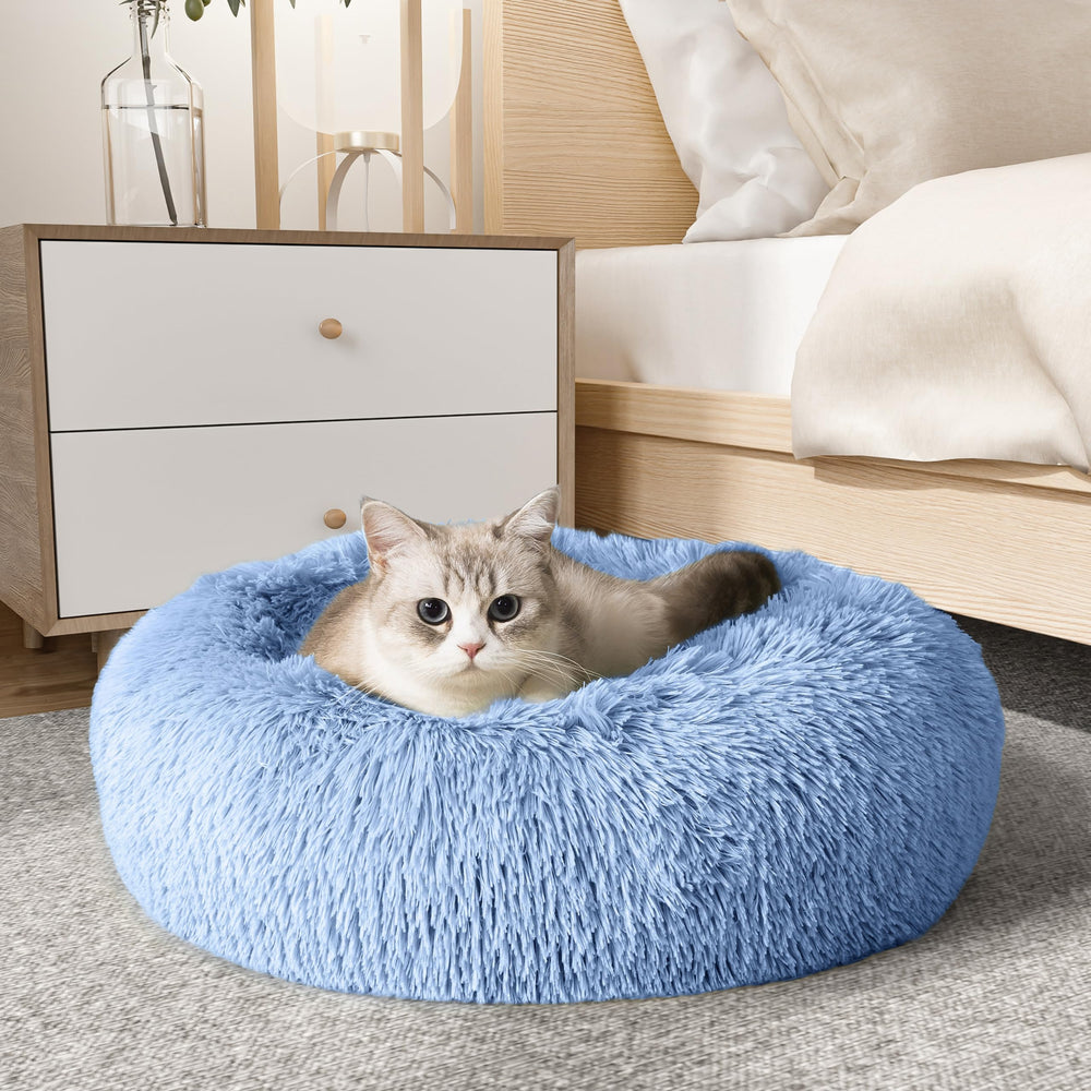 la marca Western Home WH, cama calmante para perro y gato, diseño envolvente para seguridad.