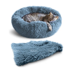 Whiskers & Friends cama redonda para gatos y perros, aporta calor y seguridad.