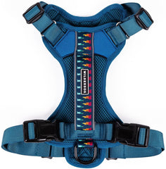 Arnés Wilderdog ligero en azul pacifico para paseos cómodos.