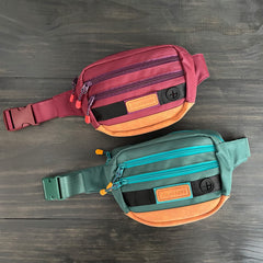 Riñonera Wilderdog Huckleberry con enfásis en bolsillos traseros para objetos pequeños