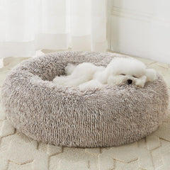 Cama donut WNPETHOME para perros, pelo falso cálido, descanso suave.
