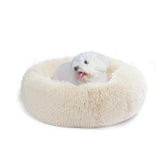 Wrkfree cama para perro pequeño con forma dona blanca crema, ideal para sueño cómodo.