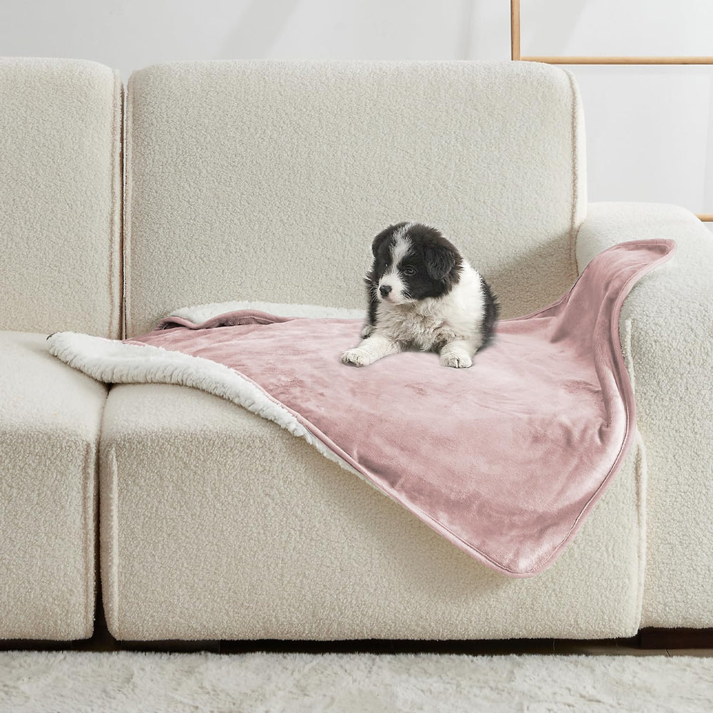 Manta Yaning impermeable para cama y sofá, frente en rosa polvoriento, protección diaria.