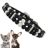YOUALSO collar de perlas negras con cristales, detalle elegante para perros.