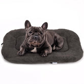 Cama para perro YUUHENG en jaula gris, descanso cómodo y seguro.