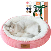 Cama Zerbuger para gatos, forma redonda y rosada, ideal para acurrucarse.