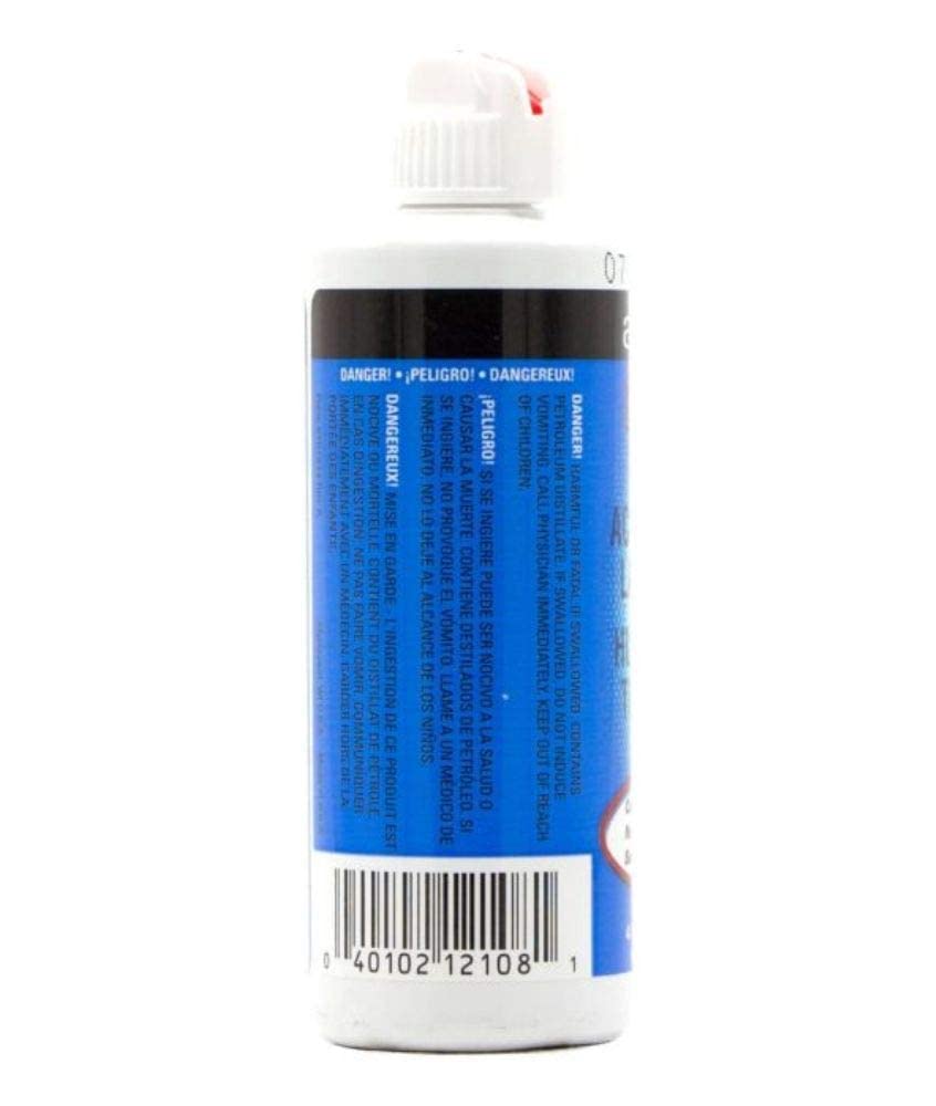 Andis aceite clipper para uso diario en barbería.
