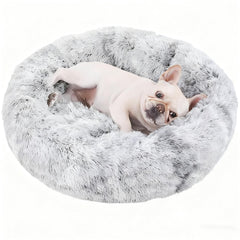 Cama Aofast circular relajante para perros y gatos, ofrece descanso cálido.