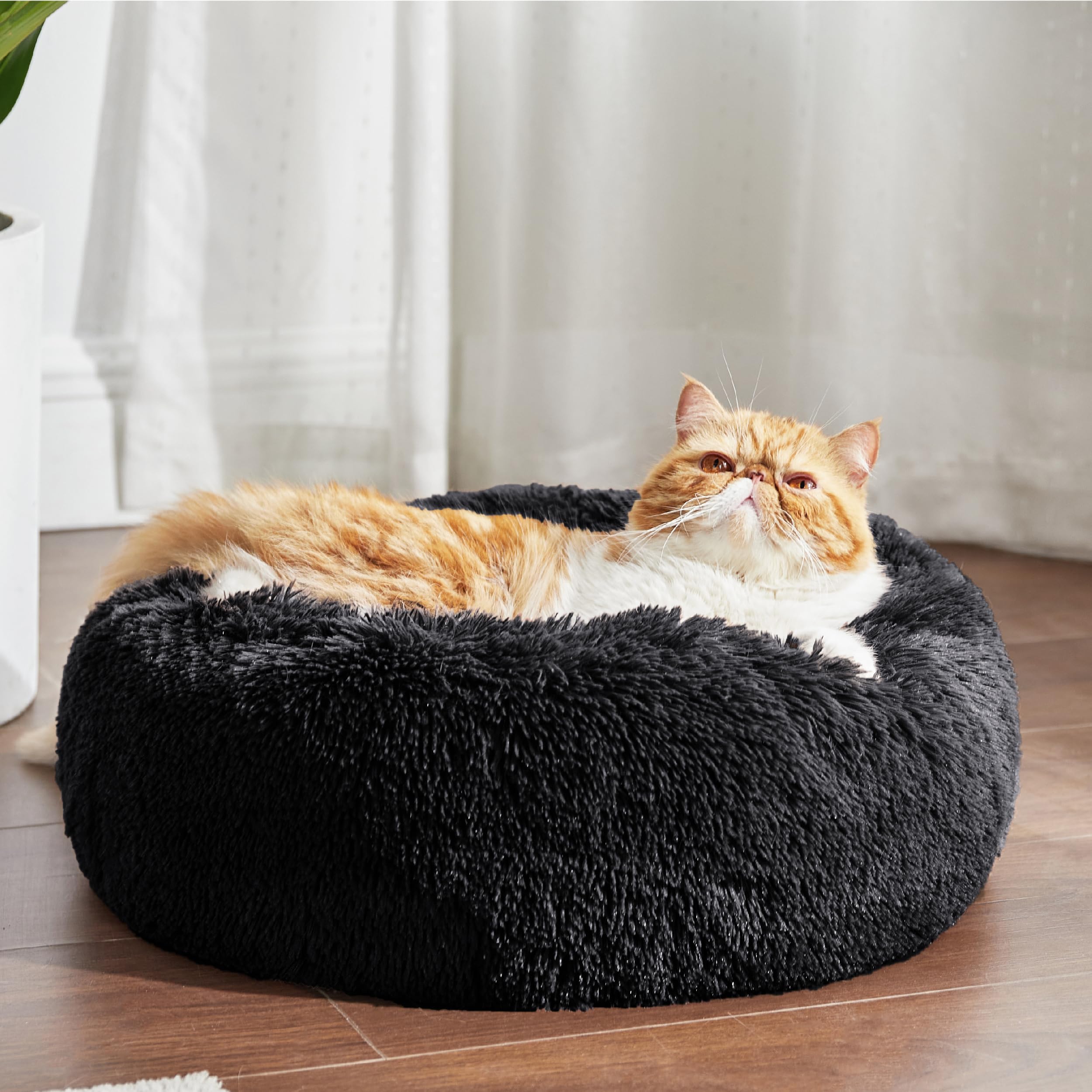 Bedsure cama gato rosquilla acogedora para descanso cómodo.