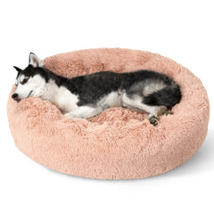 Bedsure cama para perro donut rosada, diseño suave que invita a dormir abrazado.