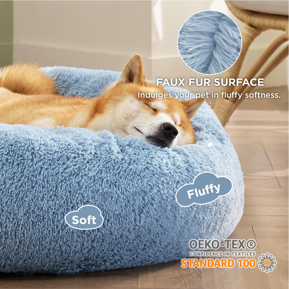 Bedsure cama perro rosquilla antideslizante base azul, evita movimientos durante el sueño.