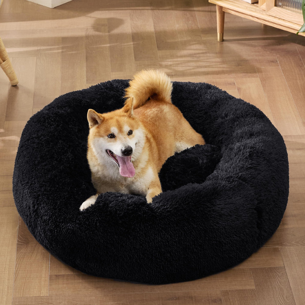 Bedsure cama para perro rosquilla base antideslizante: mantiene la cama en su lugar.
