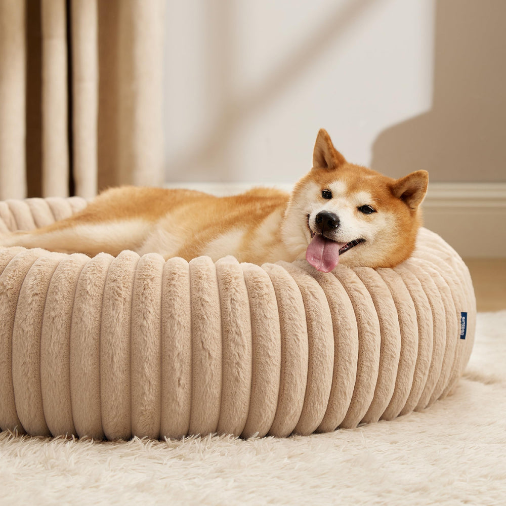 Bedsure Donut, base de apoyo suave para horas de descanso seguras.