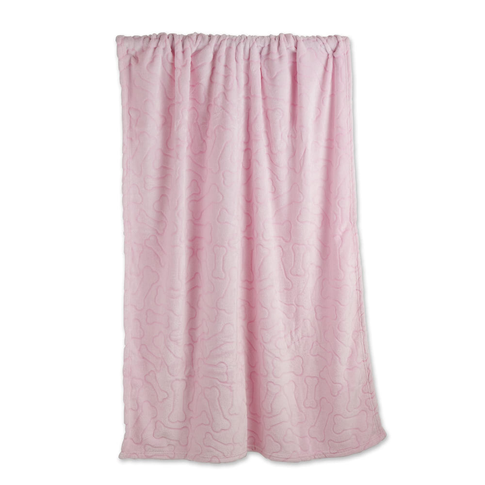 Bone Dry manta rosa con estampado de hueso, ideal para proteger muebles.