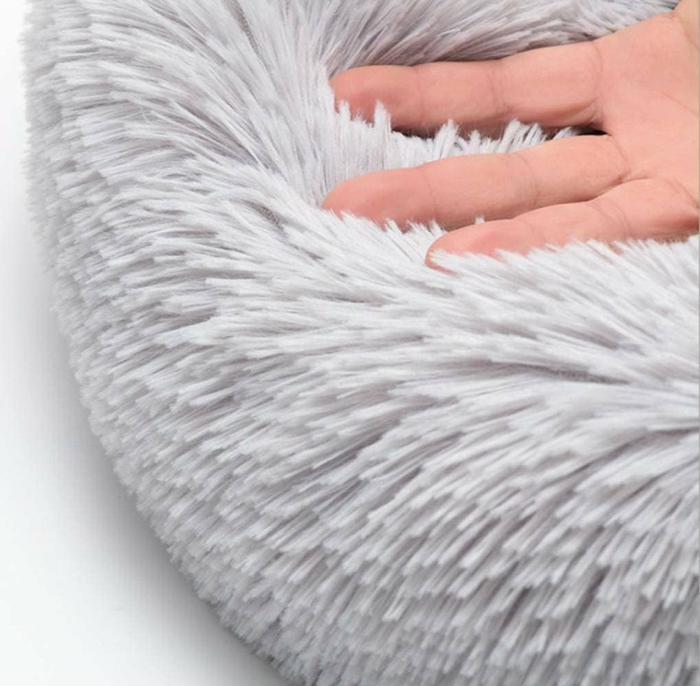 Catbeds borde acolchado ofrece apoyo para la cabeza y cuello.
