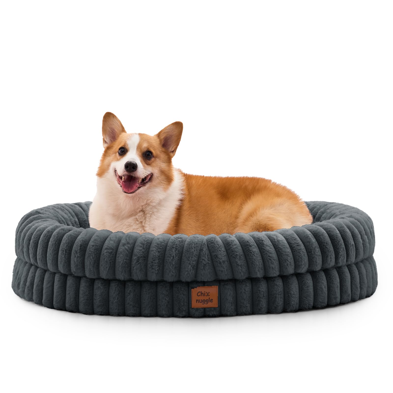 Diseño de rayas de ChiXnuggle que aporta lujo y confort al dormitorio.