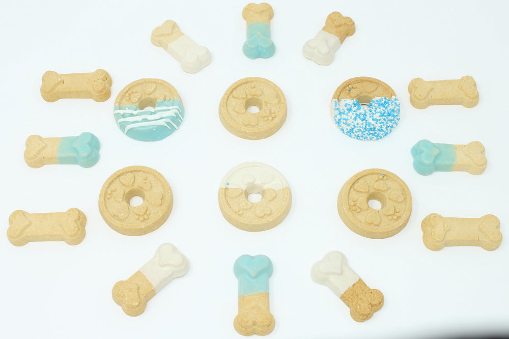 Galletas-gourmet-para-perros-decoradas de Claudia's Canine Bakery, ideales para regalos festivos