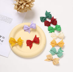 Clipband set de 60 lazos en treinta tonos pastel para combinar looks.