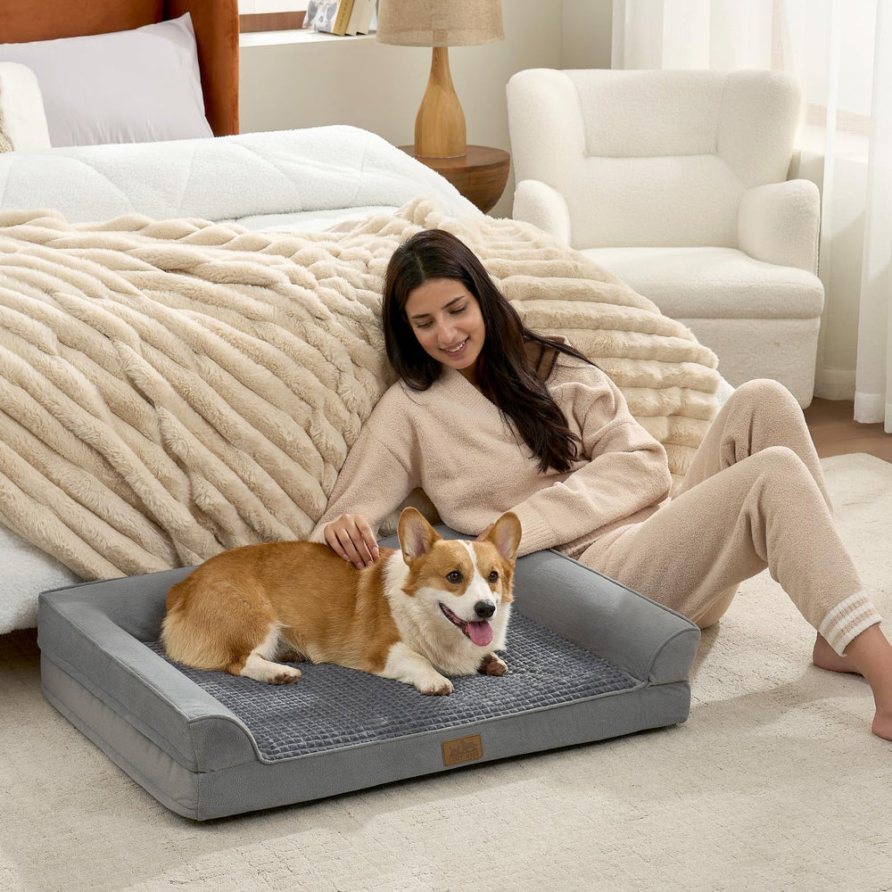 COZY KISS Cama con asa de transporte para moverla fácilmente.