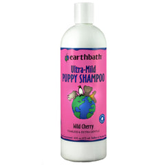 earthbath shampoo para cachorros, botella visible, aroma suave a cereza.