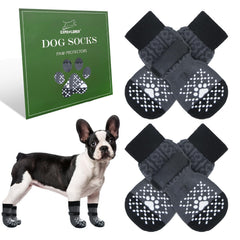 EXPAWLORER calcetines para perros, vista frontal sobre suelo de madera, ayudan a evitar deslizamientos.