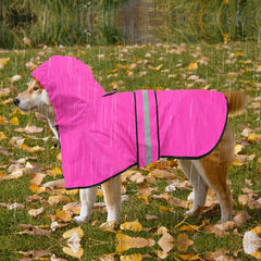 Poncho rosa reflectante para perro con cierre ajustable para comodidad.