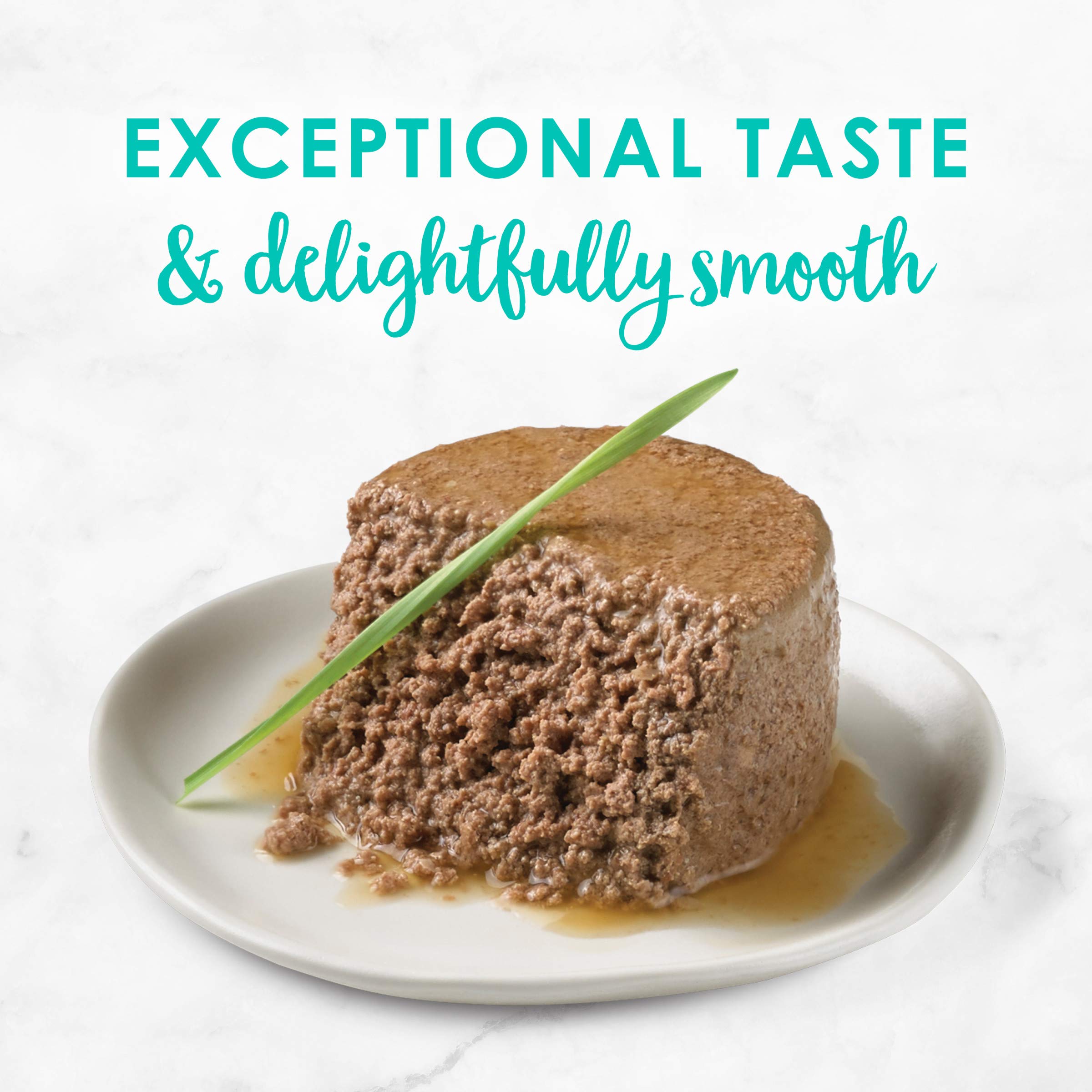 Fancy Feast Paté blanco oceánico con atún, aroma marino y servicio práctico.
