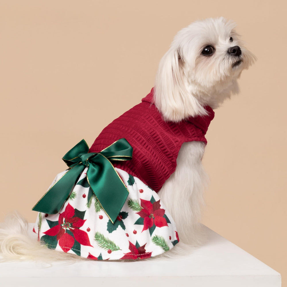 Vestido Fitwarm con poinsettia y lazo verde, perfecto para reuniones.