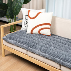 Funda de sofá Flying Paws lavable, protege el mueble de manchas.