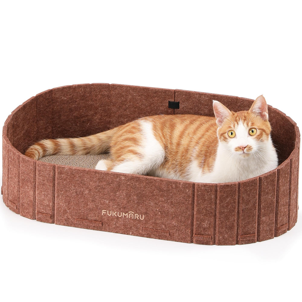 Rascador para gatos FUKUMARU con sofá ovalado de 24 pulgadas, ideal para rascar y dormir.