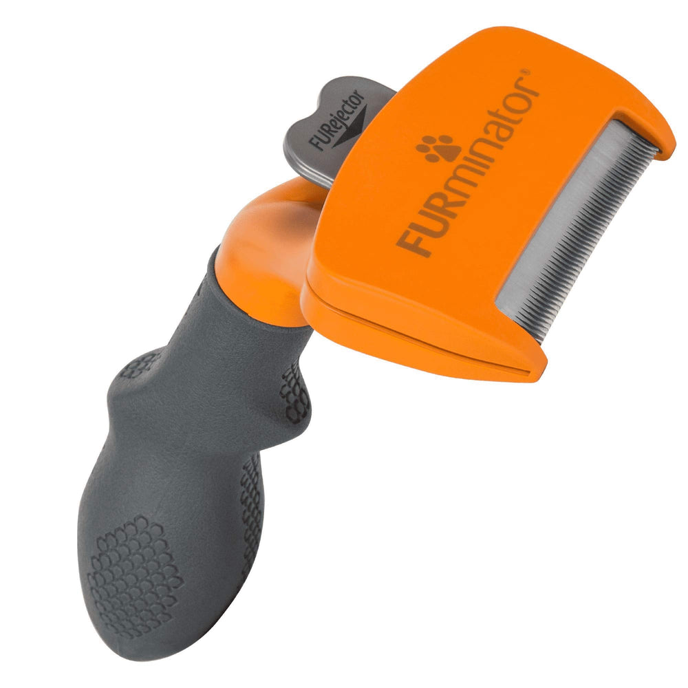 FURminator para perro mediano, herramienta deshedding enfocada en cepillado efectivo.