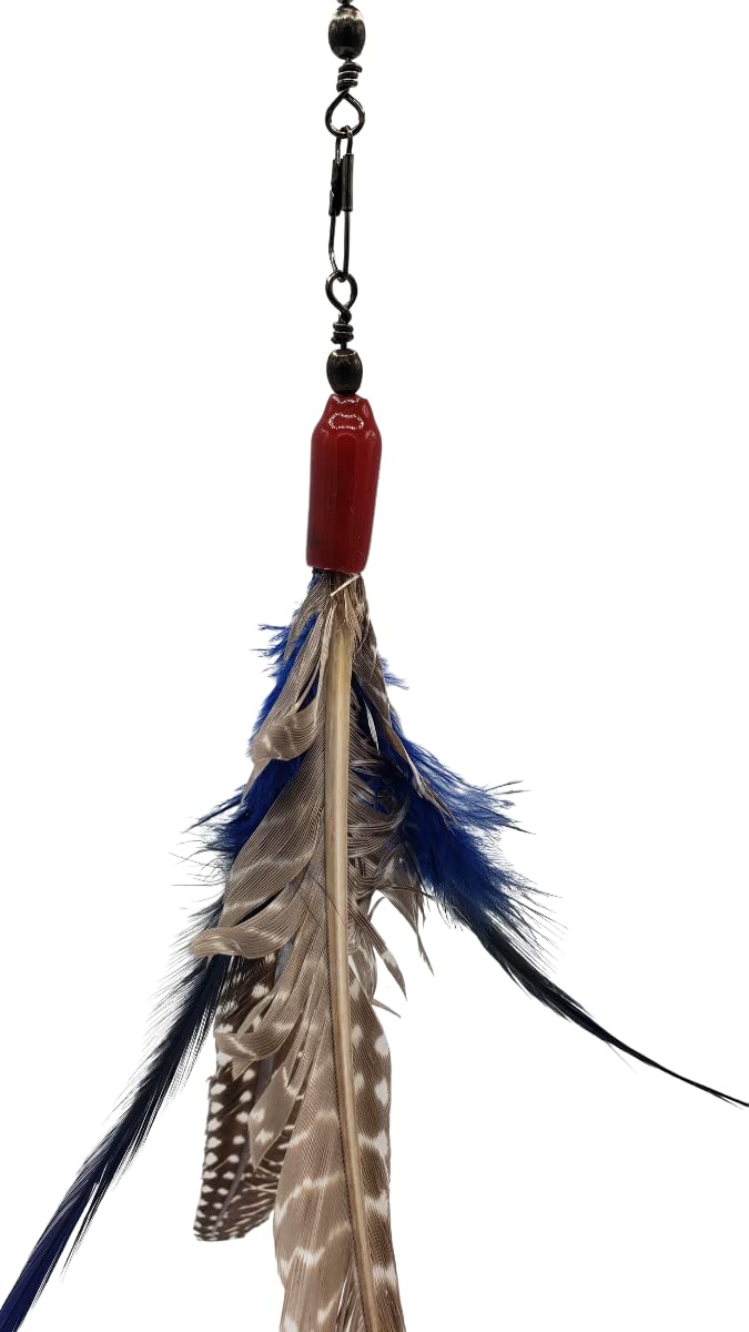 Pluma de guinea real para estimular la caza y la curiosidad.