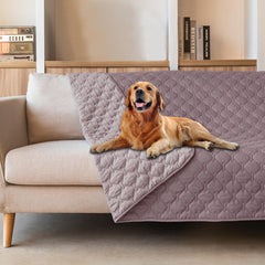 Manta impermeable de doble cara gogobunny sobre un sofá, protección para muebles.